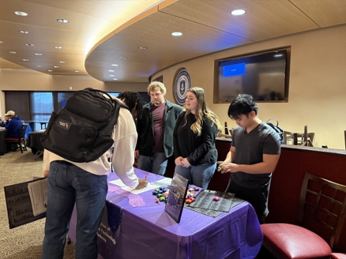 Officers Anna Schumaker and Garrett Evans, Dr. Edge, and Julie Allen, MGA professor, welcomed students and shared club information, brochures, pocket flyers, and stress relief stars with encouraging quotes.